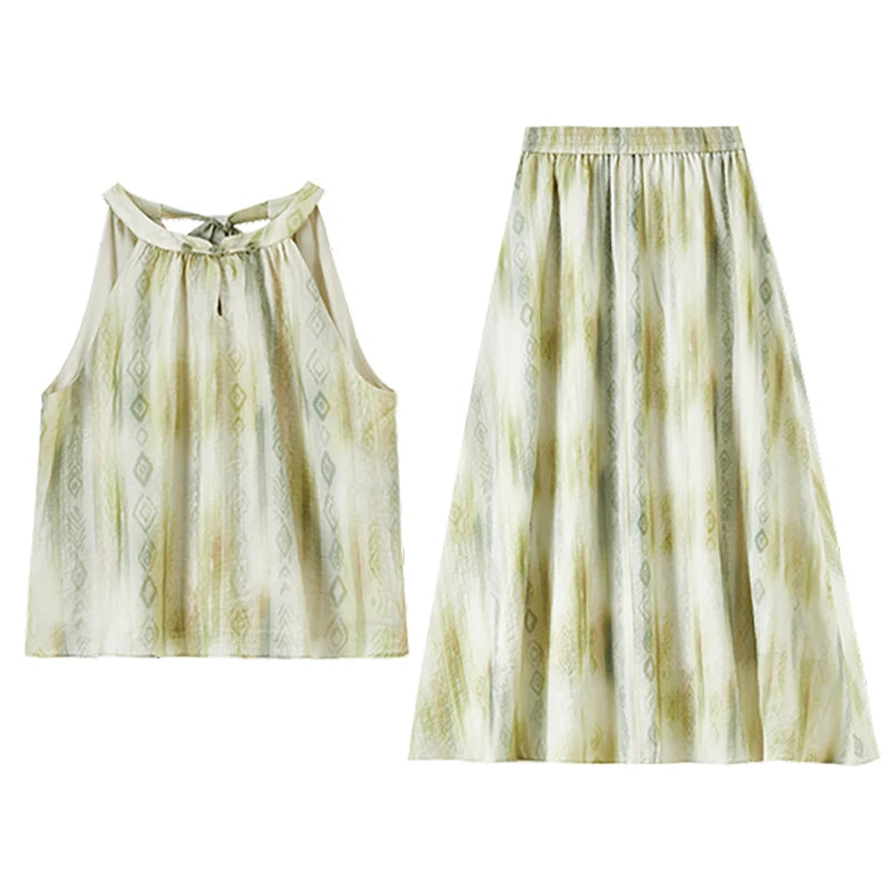 Flat lay of the Inner Charm set, showing the front design of the halter top and flared skirt — From Borcelleclothes.