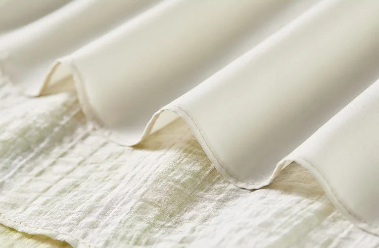 Detail of the 100% polyester lining, ensuring opacity and comfort for the semi-sheer lyocell outer — From Borcelleclothes.