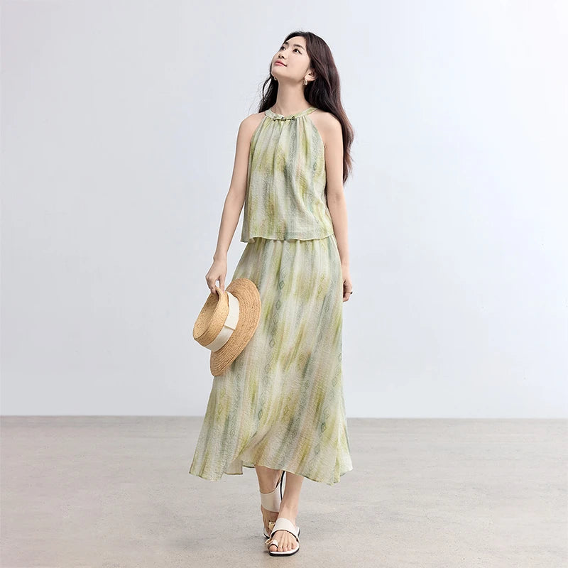 Women's two-piece set in Inner Charm color, featuring a loose-fitting halter top with rouleau loop detailing and a flared midi skirt. — From Borcelleclothes.