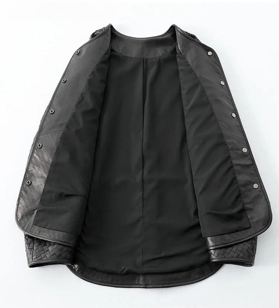Unfolded flat lay showing interior lining and edge finish of woven sheepskin jacket — From Borcelleclothes.