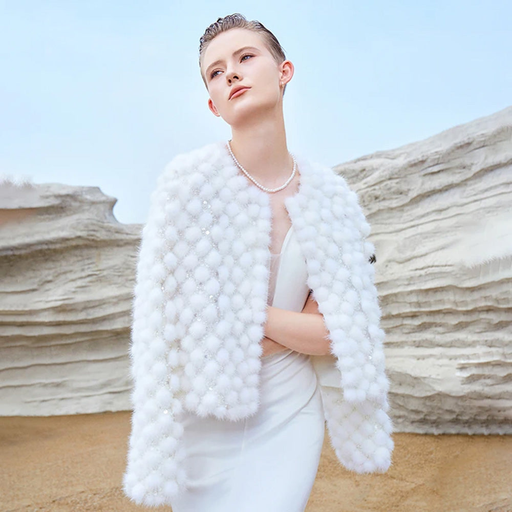 Women’s mink mosaic coat made of individually attached sheared mink pom-poms and hand embroidery on mesh — in color White Whimsy. — From Borcelleclothes.