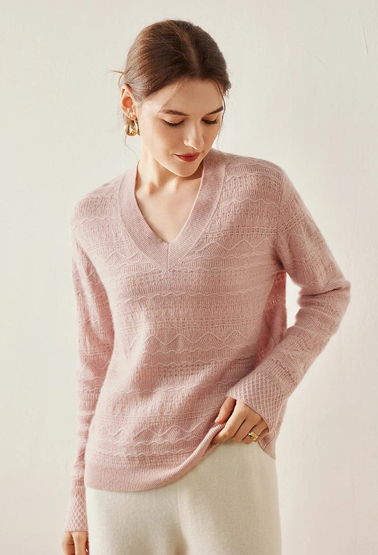 Jacquard Cashmere Blend Sweater in French Romance with model lifting bottom hem slightly — From Borcelleclothes.