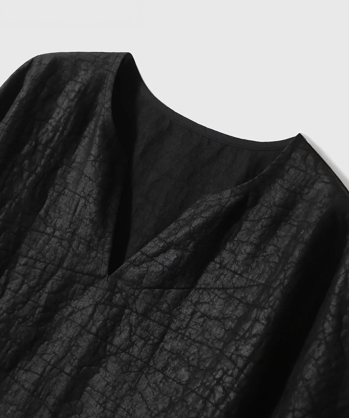 Close view of the neckline cut, split notch collar, and upper bodice of the Beyond Control Mulberry silk top — From Borcelleclothes.