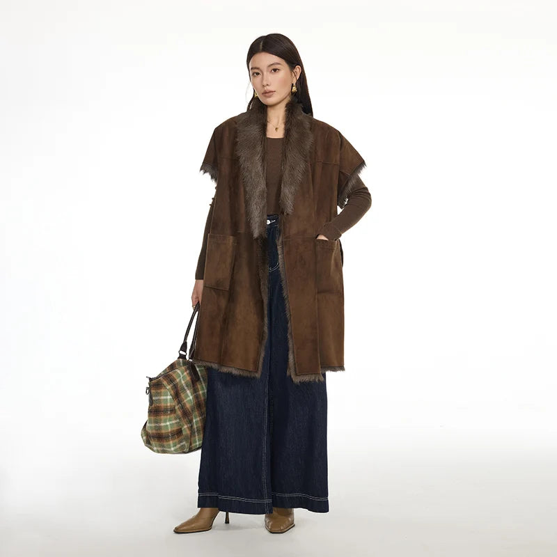 Women’s kimono-sleeve goatskin jacket in Coffeehouse Chocolate, wrap design with self-tie belt and shawl collar revealing natural fur — From Borcelleclothes.