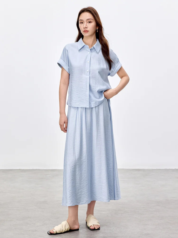 Women’s kimono set in Forget-Me-Not Mist, hand on waist highlighting the fluid drape of viscose — From Borcelleclothes.