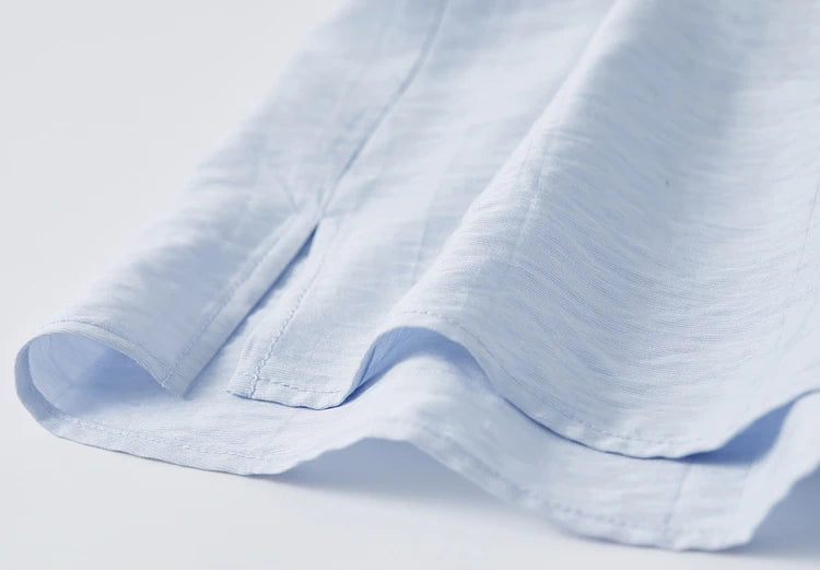 Professional finish of the side slit on the oversized kimono shirt for ease of movement — From Borcelleclothes.