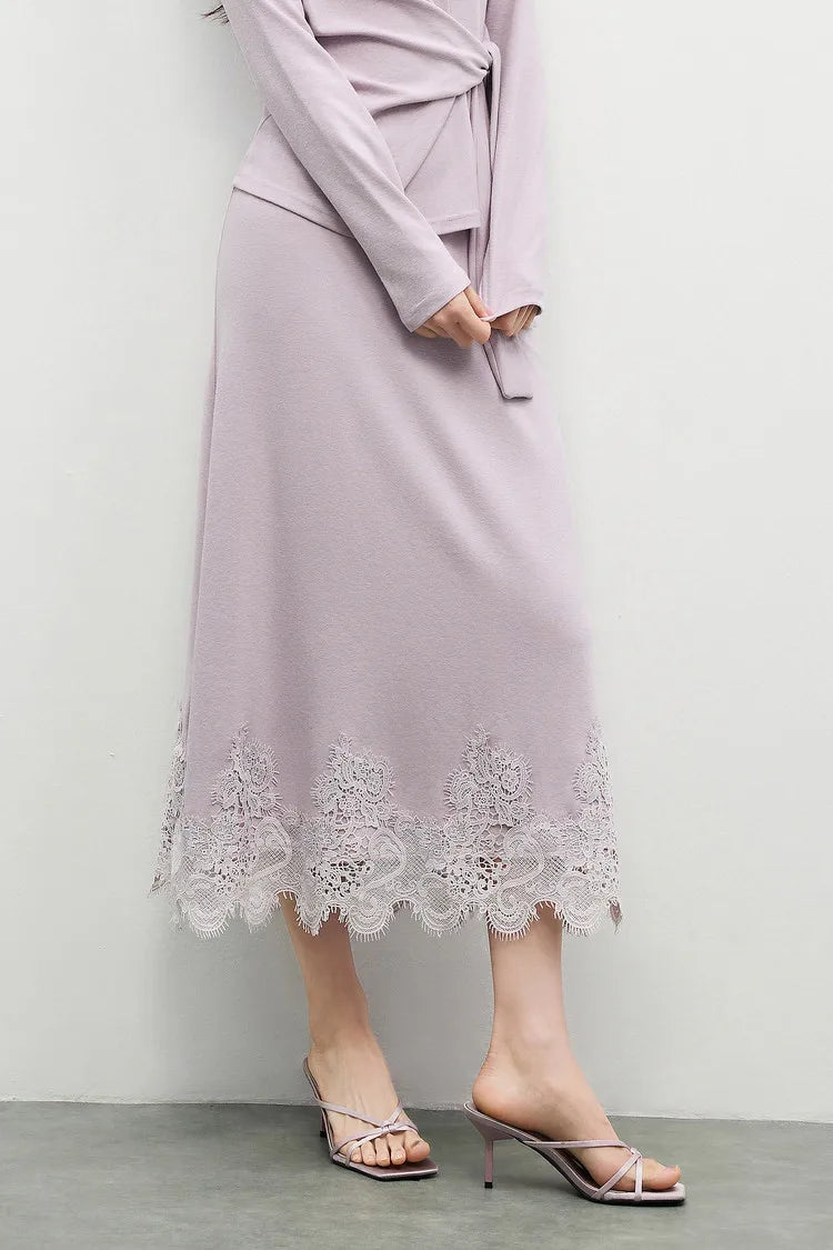 The lower section of the Almost There flared skirt, focusing on the drape and mid-calf length. — From Borcelleclothes.