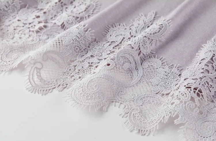 Close-up of the hemline featuring the 100% fine-gauge scalloped lace trim. — From Borcelleclothes.