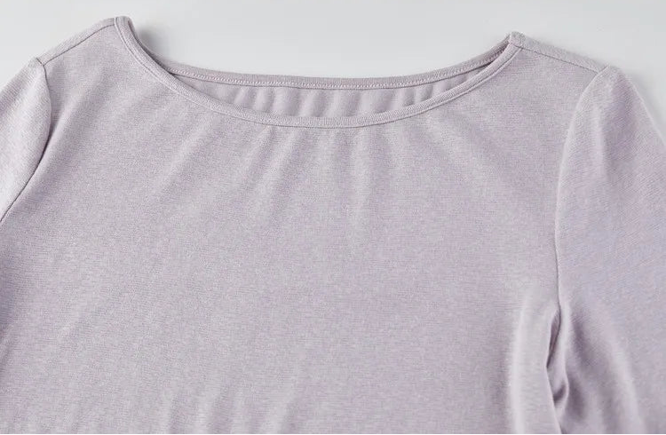 Detailed view of the wide boatneck design on the Almost There knit top. — From Borcelleclothes.