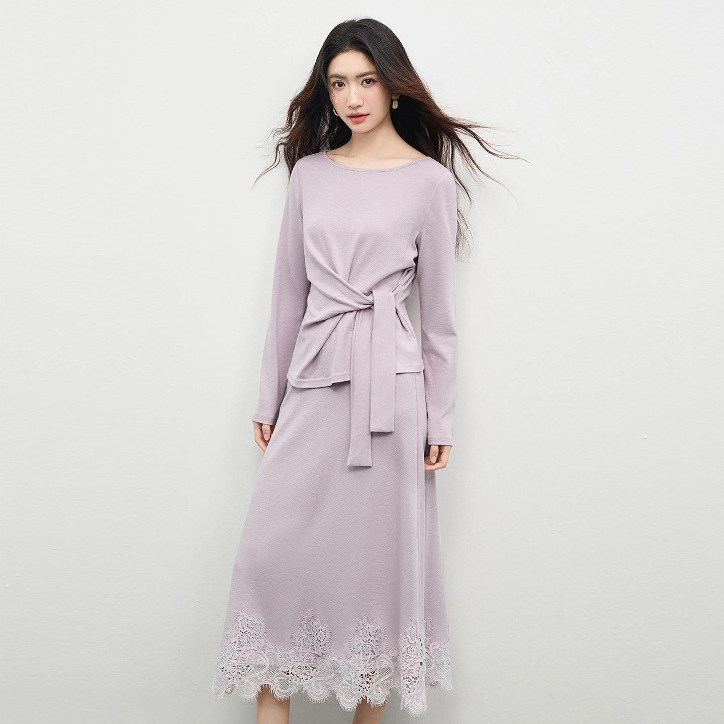 Long-sleeve knit top with origami knot and midi skirt with scalloped lace, shown in Almost There color. — From Borcelleclothes.