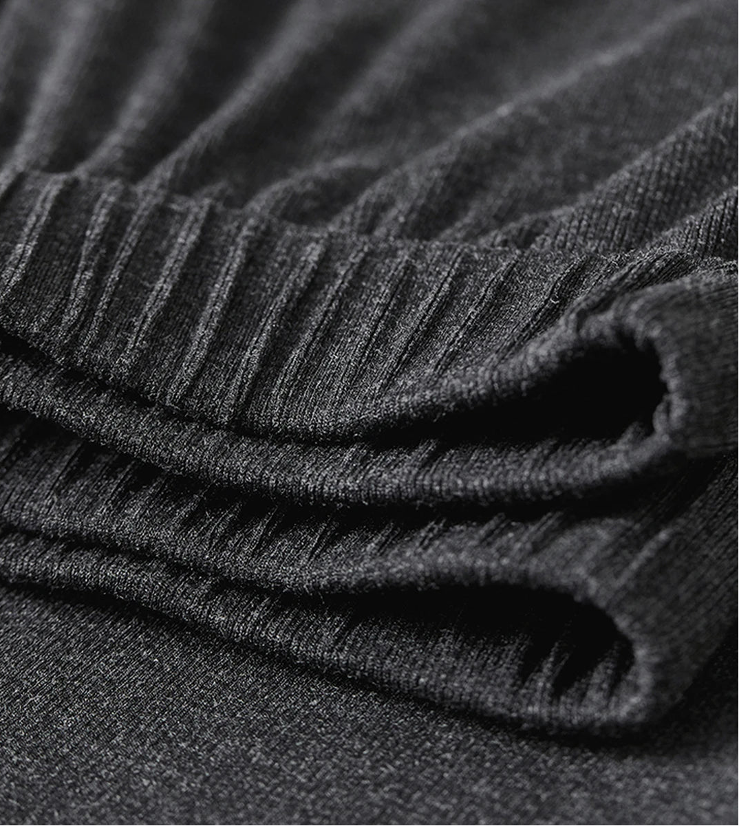 Detailed view of the elasticated waistband on the Mojo dark grey ribbed skirt — From Borcelleclothes.