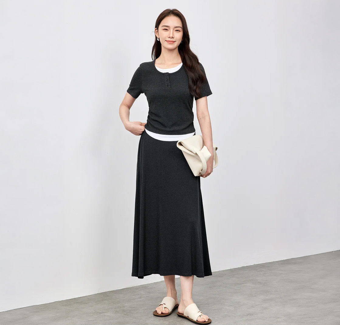 Women's ribbed knit coordinates in Mojo color, featuring a slim-fit buttoned top with white contrast inserts and a matching flared midi skirt. — From Borcelleclothes.
