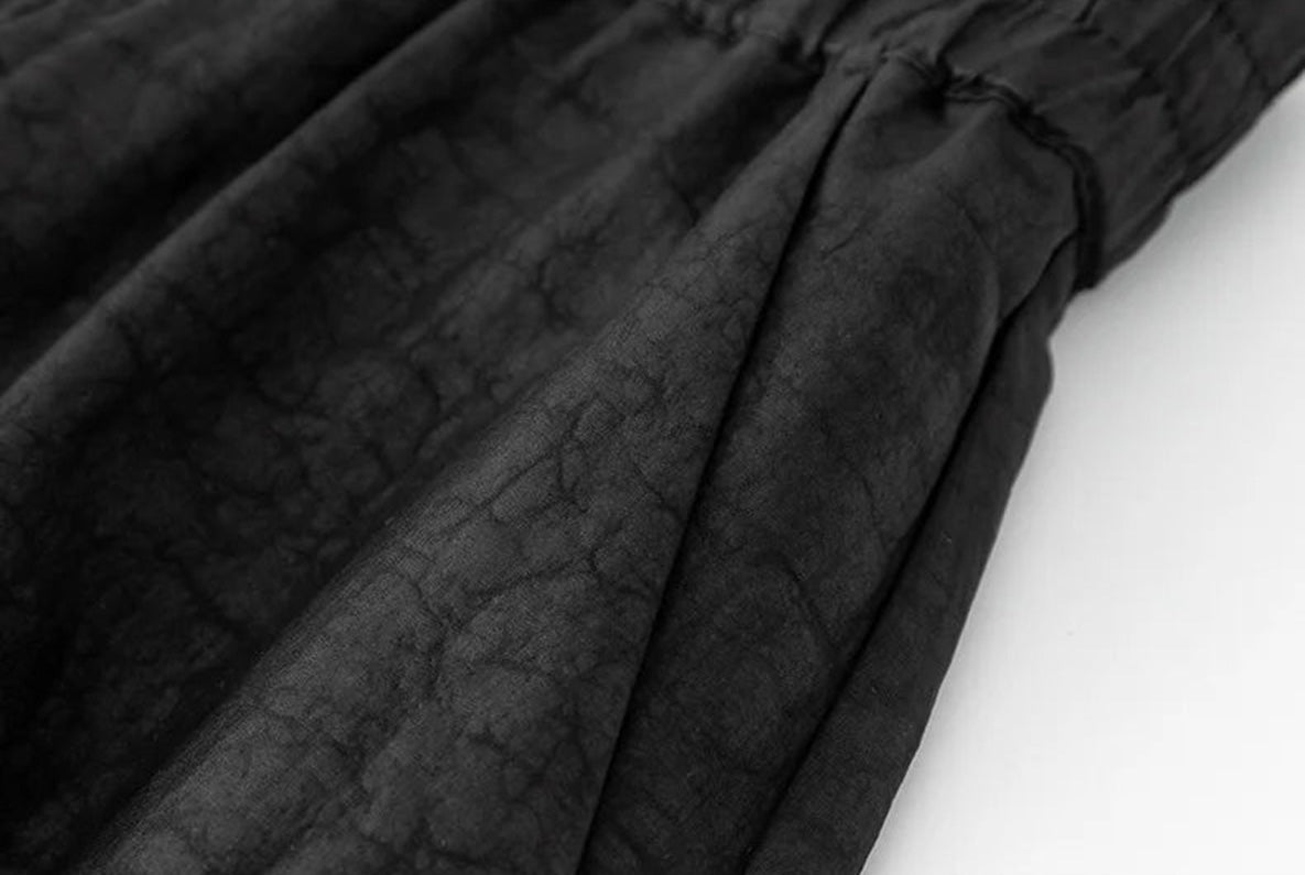 Detail view of the side pocket on black Xiangyunsha Mulberry silk lantern pants in Tortoise Ticket — From Borcelleclothes.