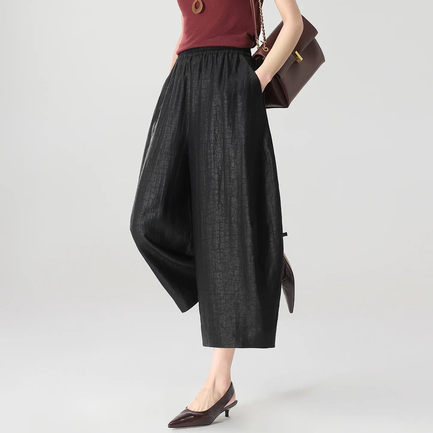 Women's Ankle-length 25 Momme Xiangyunsha Mulberry Silk lantern pants in Tortoise Ticket. Hand-dyed using traditional mud-fermentation with a natural craquelure finish. — From Borcelleclothes.