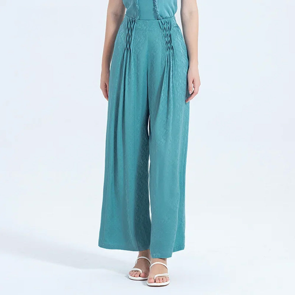 Women's Mulberry silk wide-leg trousers featuring hand-tacked pleated panels that form a sculpted lattice waist and flow gracefully into a floor-length silhouette. — From Borcelleclothes.