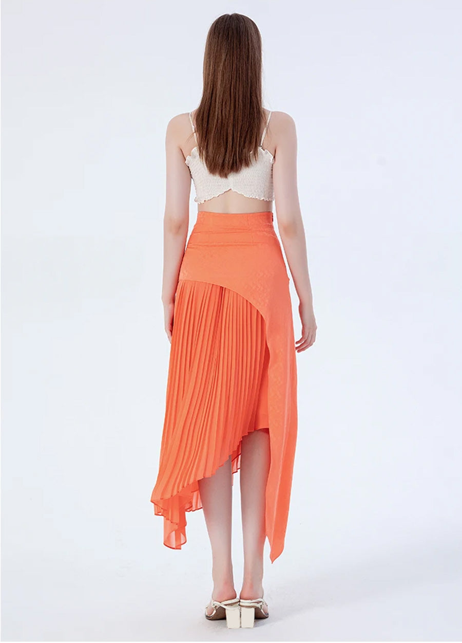 Back view of a model wearing a women's layered asymmetrical Mulberry silk skirt in Veiltail Gold — From Borcelleclothes.