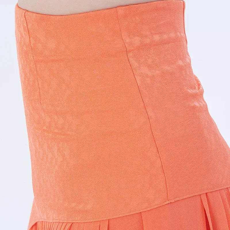 Side view detail of the waist section on a women's layered asymmetrical Mulberry silk skirt in Veiltail Gold — From Borcelleclothes.