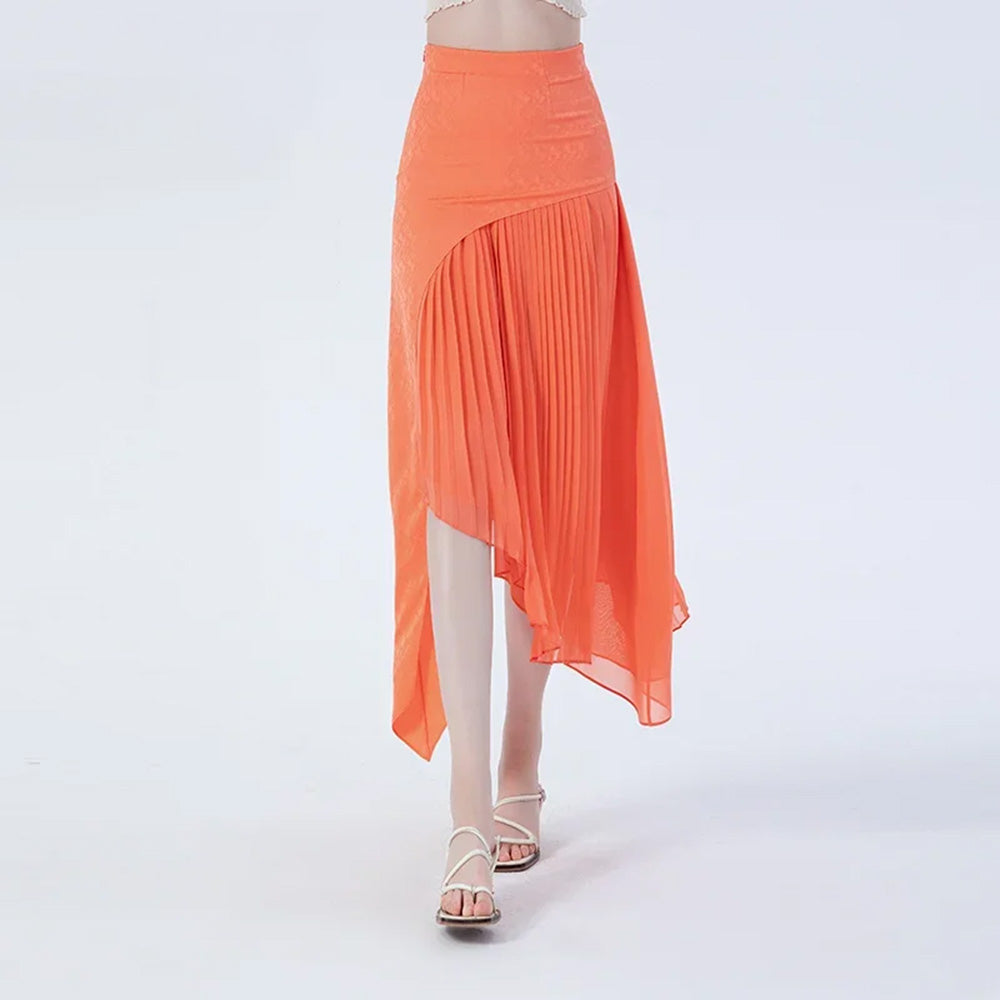 Women's layered asymmetrical Mulberry silk skirt in Veiltail Gold hue. Features a trailed heavyweight jacquard overlay and a sloping pleated georgette base. — From Borcelleclothes.