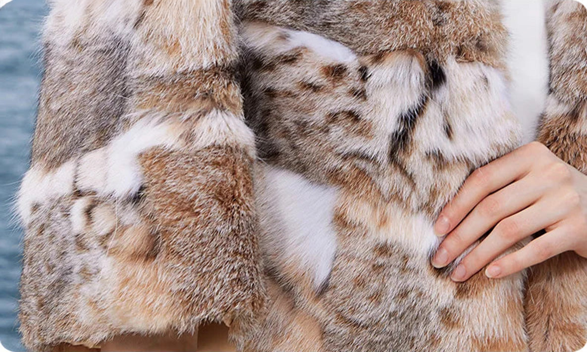 Detailed shot of the wild-spotted lynx fur texture in the Shades of Forest colorway — From Borcelleclothes.
