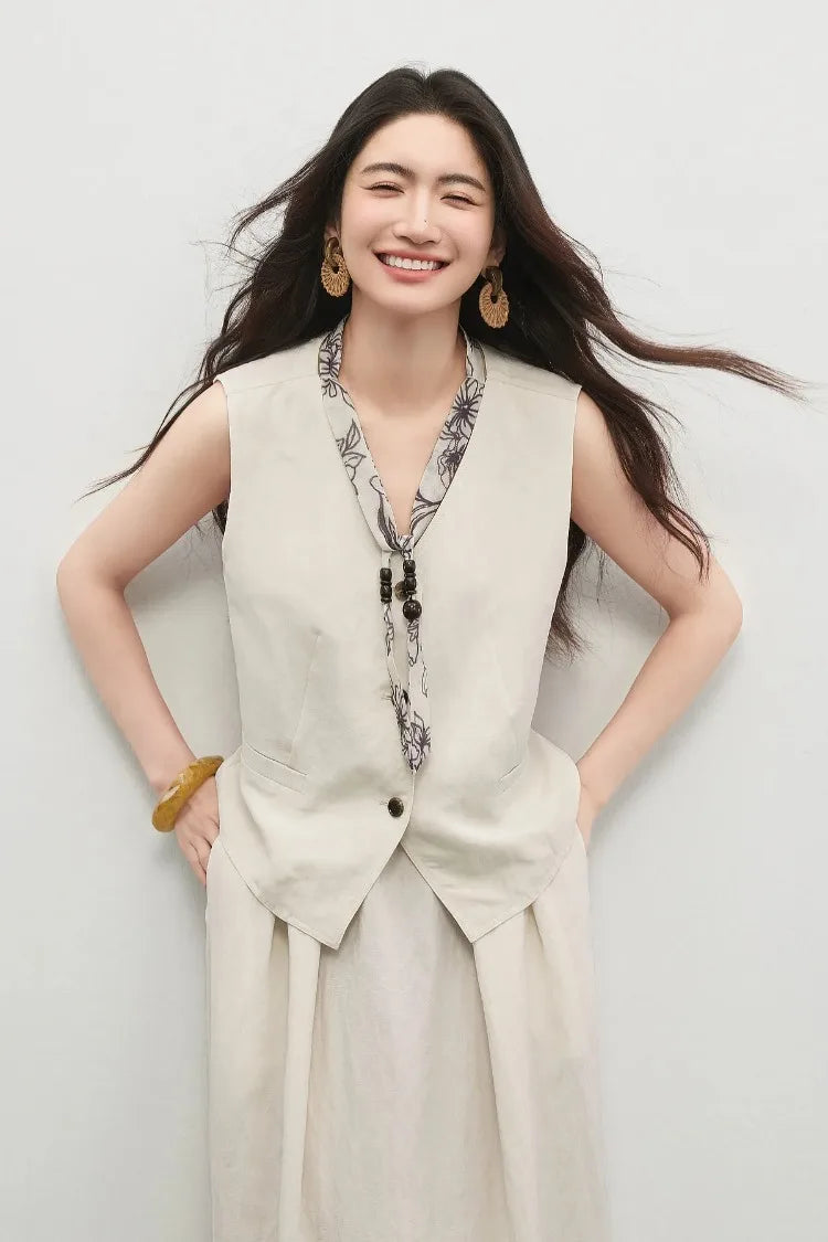 The effortless comfort of a woman smiling with her hands in her skirt pockets — From Borcelleclothes.