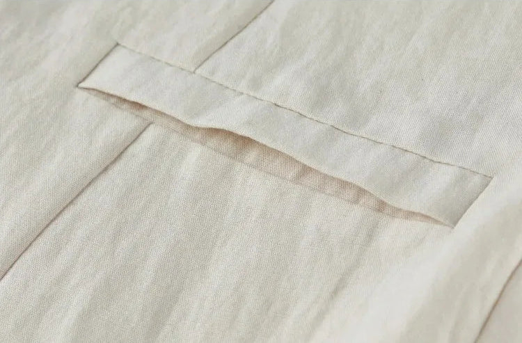 Close-up of the practical side single-welt pocket on the vest — From Borcelleclothes.