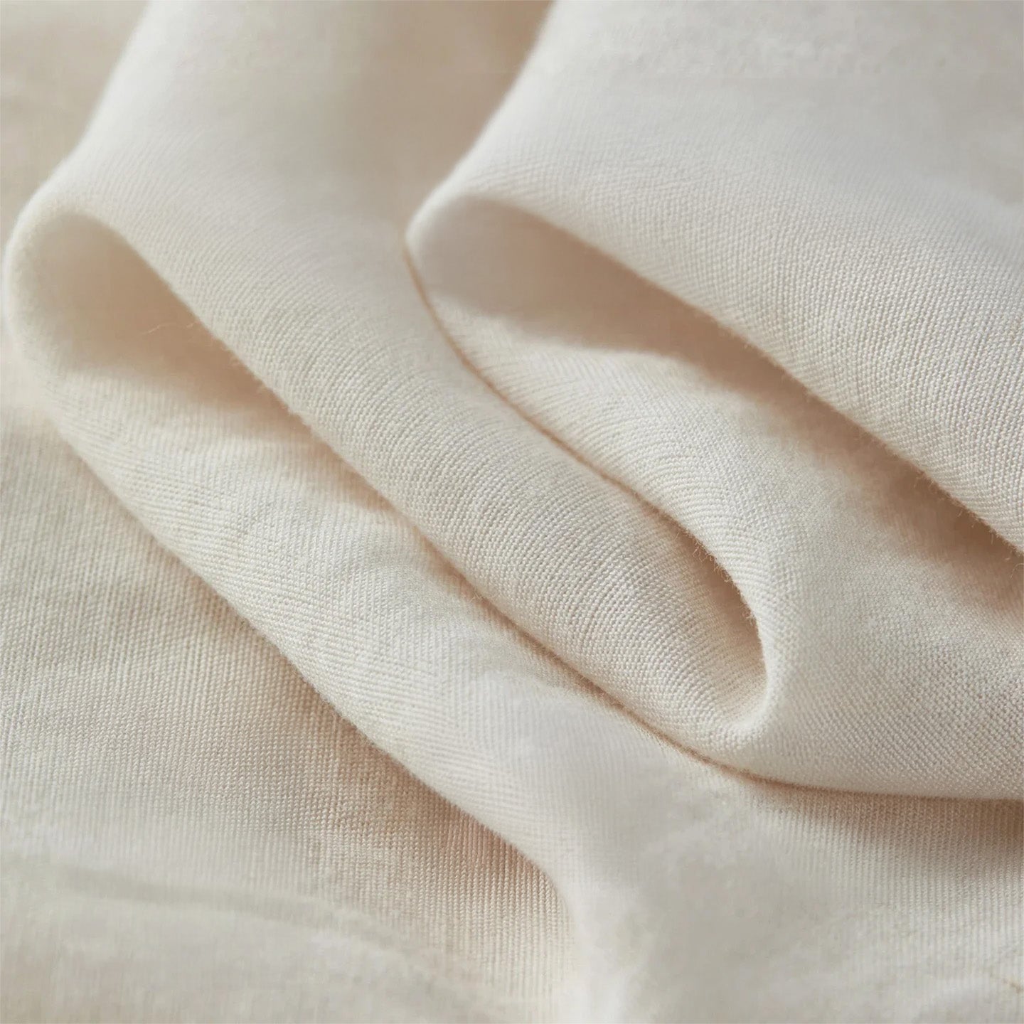 Close-up of the soft, wave-like texture of the lyocell-linen fabric — From Borcelleclothes.