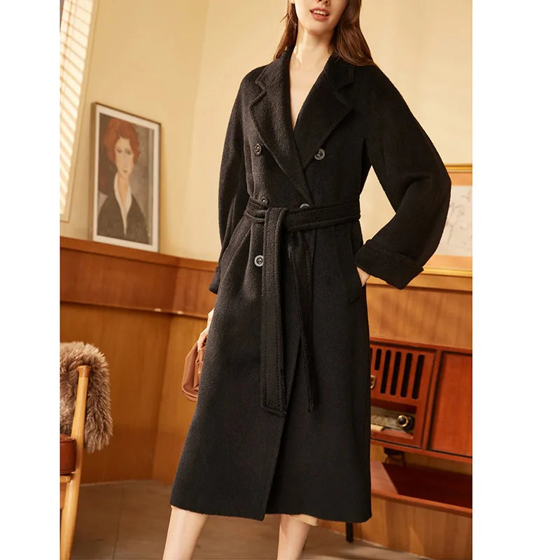 Women's Mid-Calf Alpaca Coat in Onyx, showcasing the elegant double-breasted design, seamless kimono sleeves, and luxurious Suri alpaca and cashmere blend with a soft fur-like texture. From Borcelleclothes.
