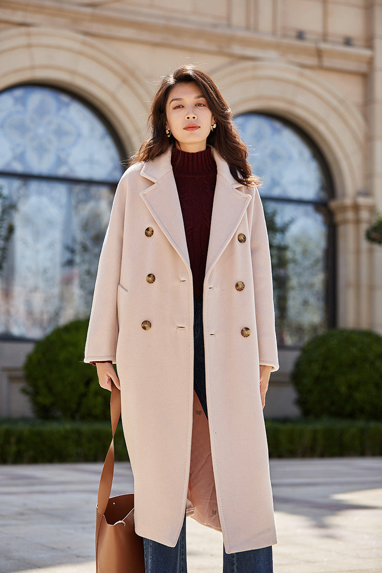 The soft lilac hue of Blossom Dust paired with a bold, oversized bag for a modern spring look. From Borcelleclothes.