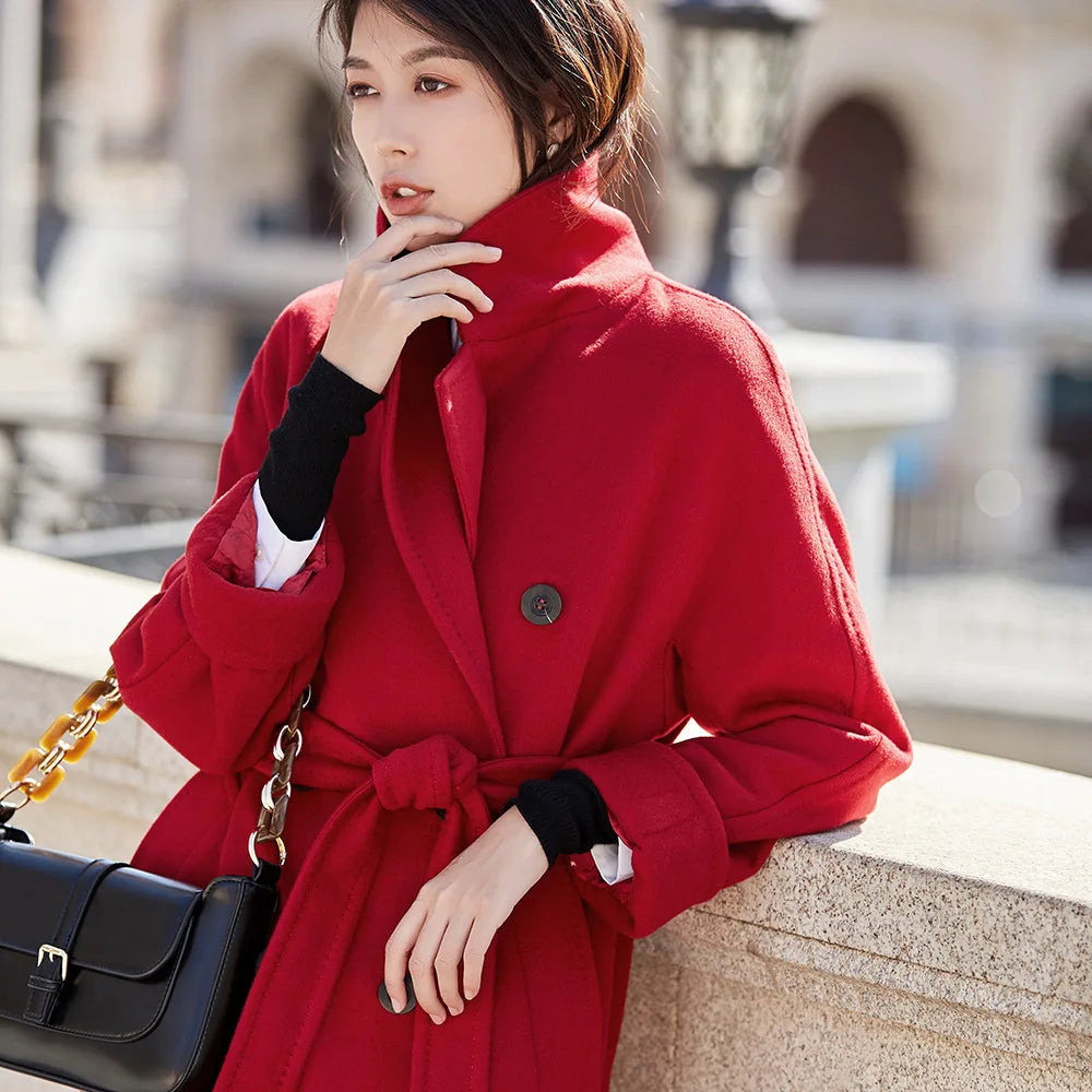 Women's mid-calf 100% lambswool coat in Cinnabar Soul, featuring a double-breasted design with tortoise-shell buttons and structured sleeve panels. — From Borcelleclothes.