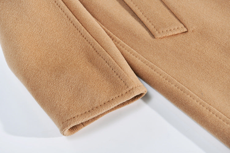 The refined detail of the cuff; French Beige Coat. From Borcelleclothes."