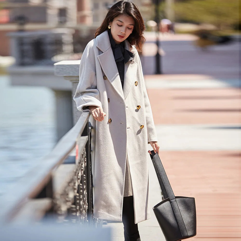 Women's mid-calf 100% lambswool coat in Romantic Light, featuring a double-breasted design with tortoise-shell buttons and structured sleeve panels. — From Borcelleclothes.