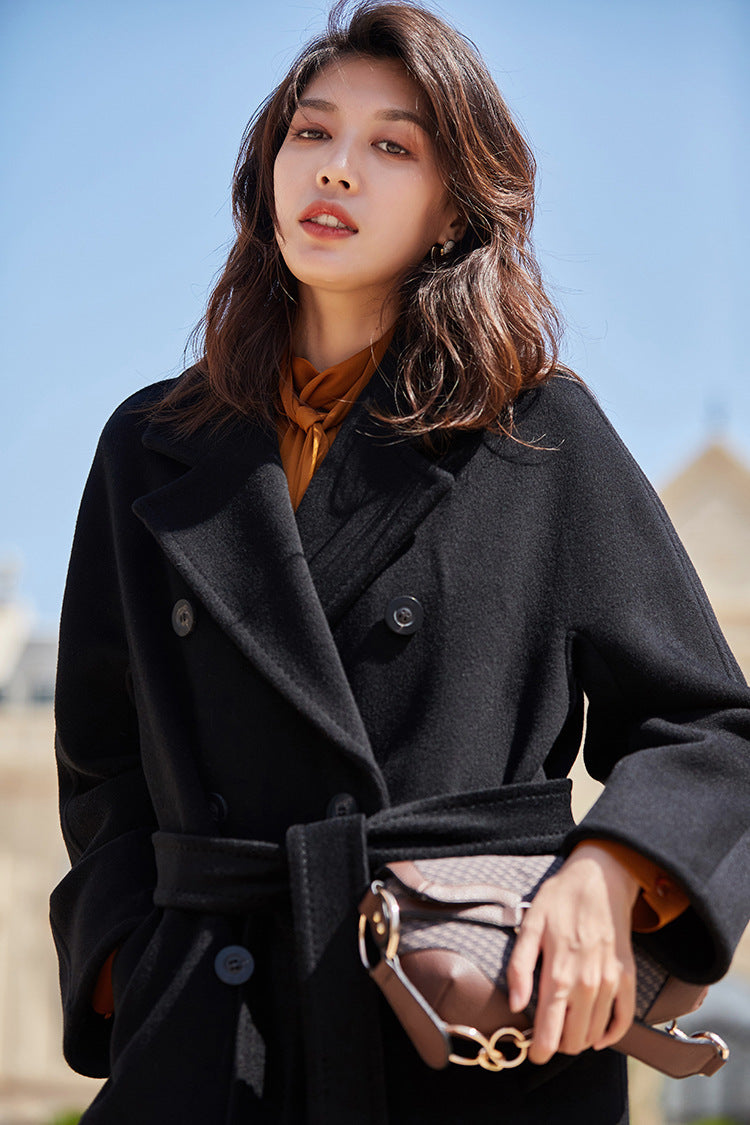 A color beyond time—Signature Black held with a confident hand on the hip. From Borcelleclothes.