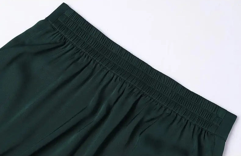 Detail shot of the elasticated back waistband on Cyber Jade Mulberry silk trousers — From Borcelleclothes.