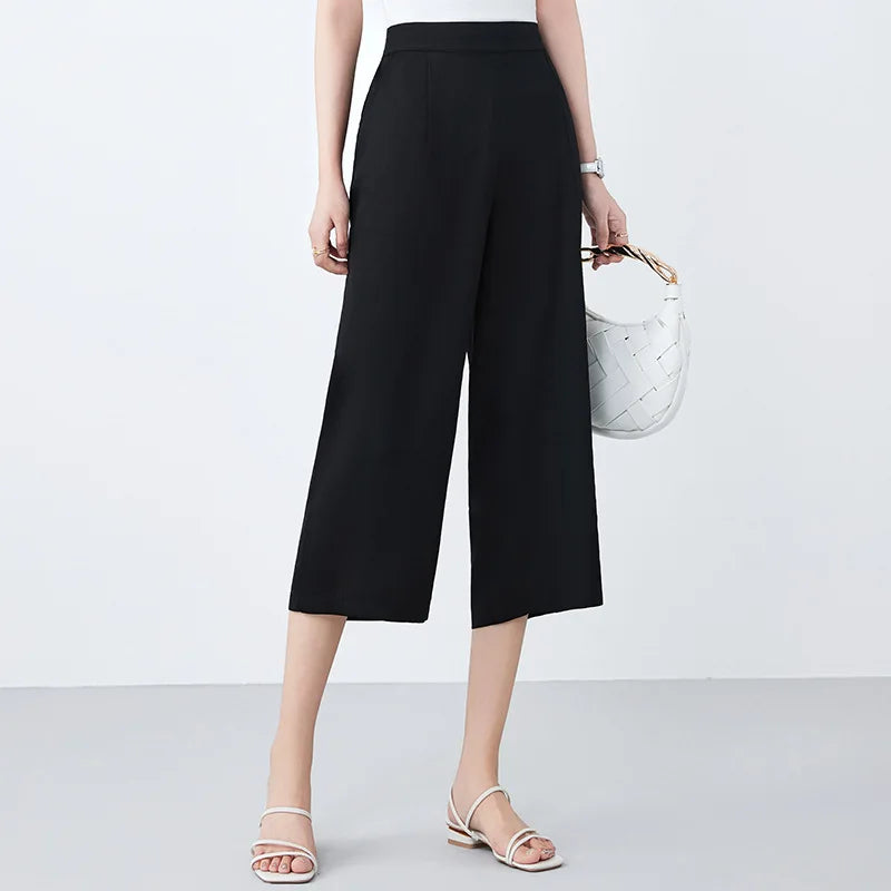 Women's wide-leg Mulberry silk trousers in Tactile Setting with front pleats, elasticated waistband & pockets. — From Borcelleclothes.