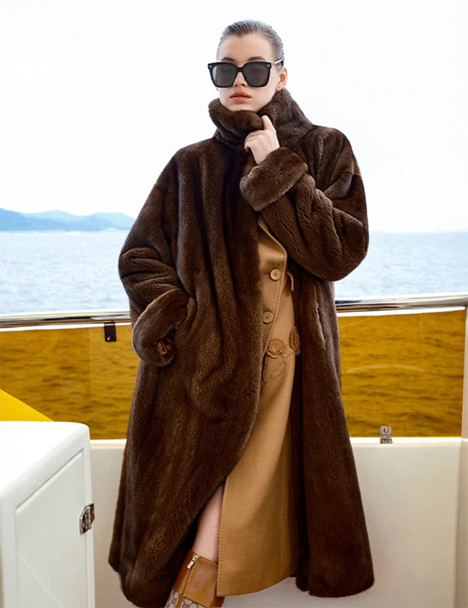 Women’s minimalist full-length mink fur coat with clean silhouette, hidden hook closure, and seamless surface — shown in Mirage of Marron. — From Borcelleclothes.