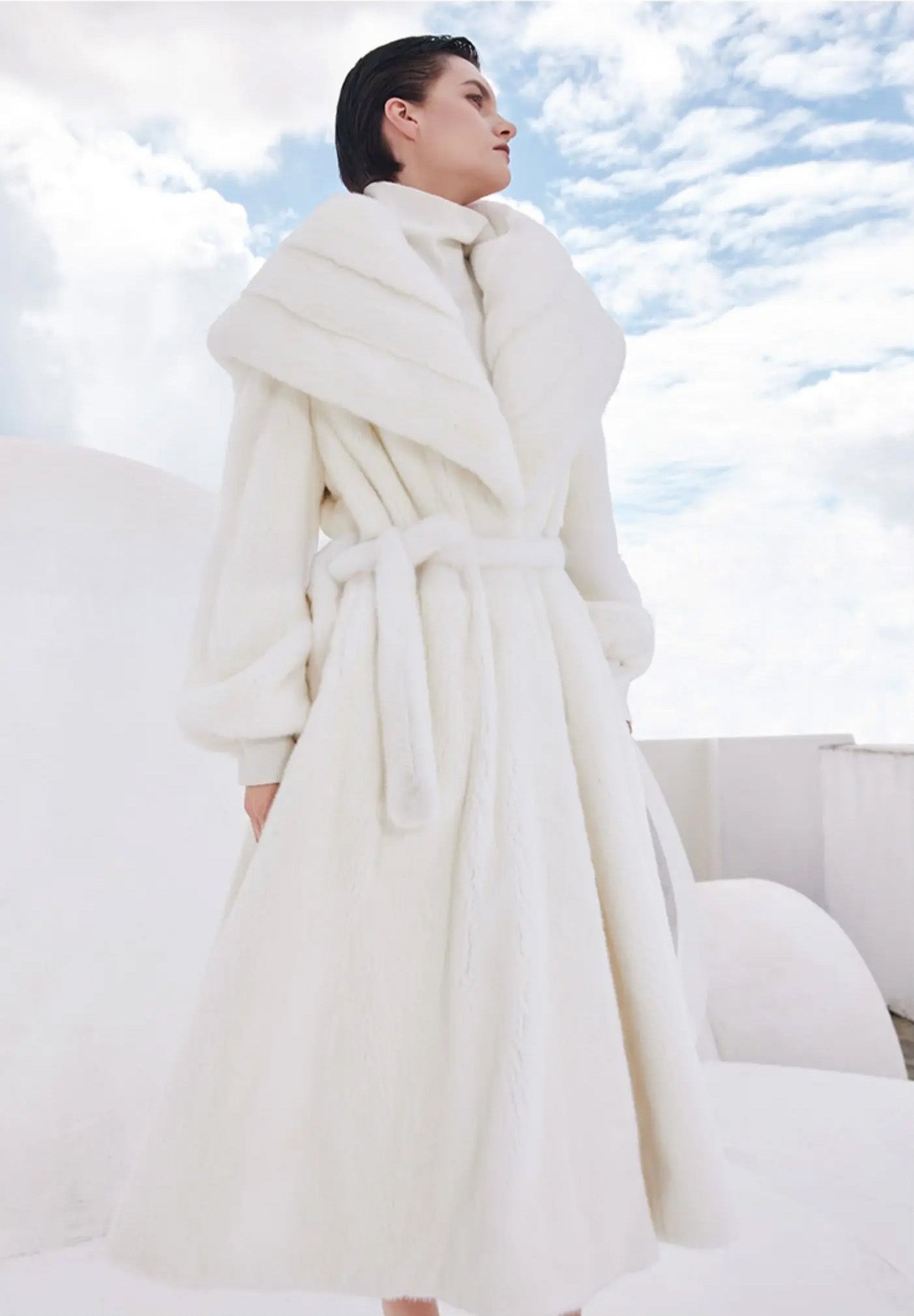 Model wearing the Donne-Moi Ton Cœur mink coat, head turned slightly to the side — From Borcelleclothes.