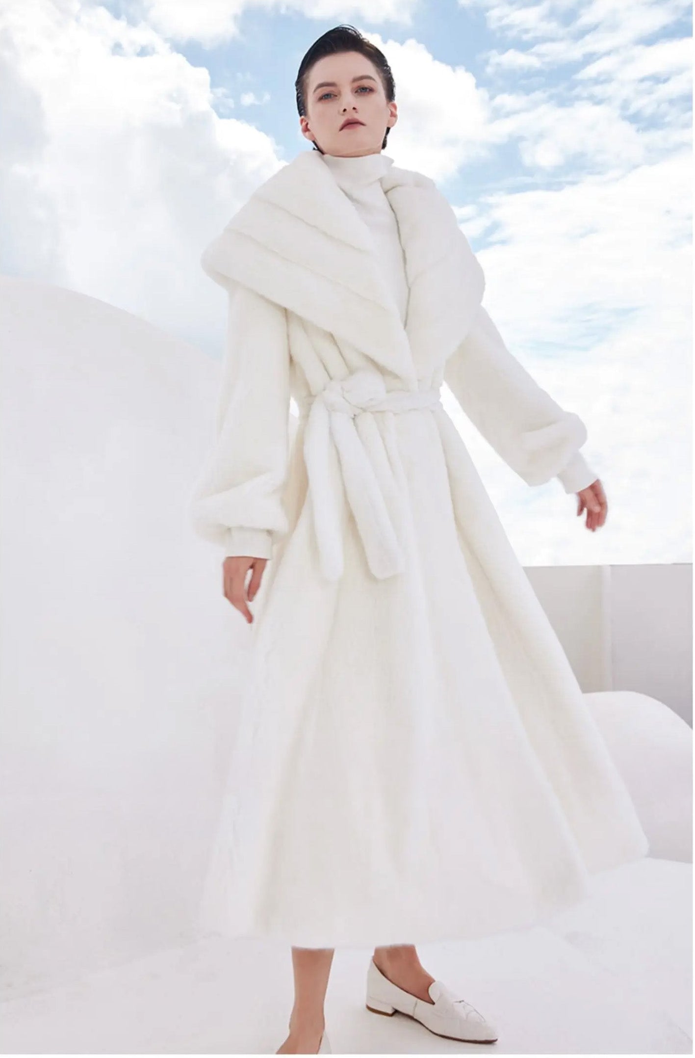 Model swirling in the Donne-Moi Ton Cœur mink coat, capturing the natural flare and movement of the cut — From Borcelleclothes.