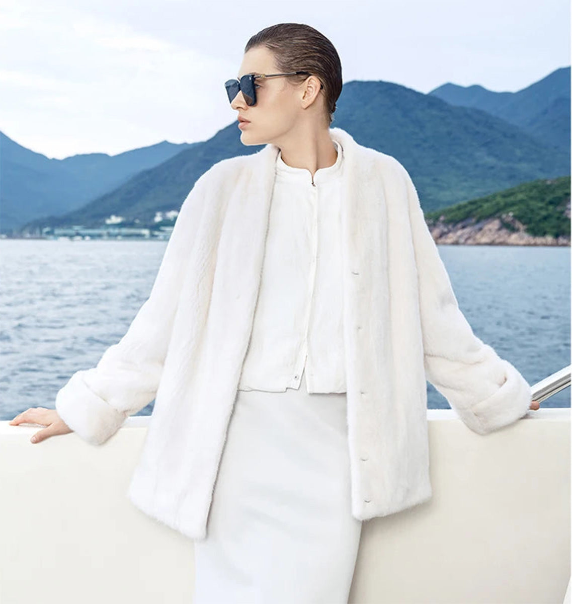 Women's sheared mink coat with V-neckline and turned-back cuffs, relaxed straight silhouette, shown in Pale Reverie color — From Borcelleclothes.