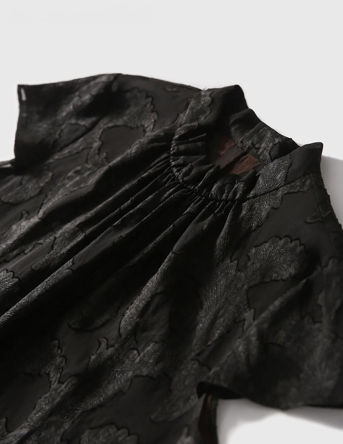 Front close-up of the Women's Mulberry Silk Blouse in Bittersweet Noir, showing the wide banded neckline and center gathers — From Borcelleclothes.