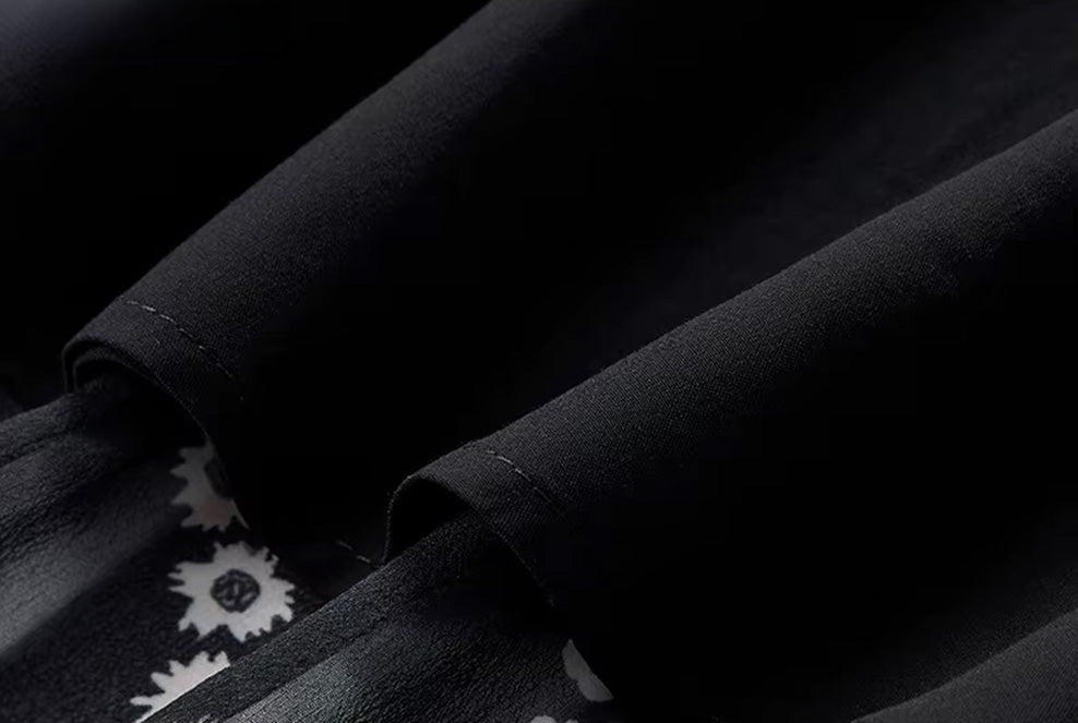 Close-up of the structured black viscose lining underneath a semi-sheer silk georgette skirt — From Borcelleclothes.