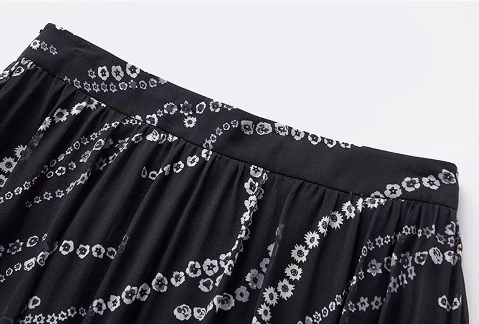 Front view of a gathered waistband on a black silk skirt — From Borcelleclothes.