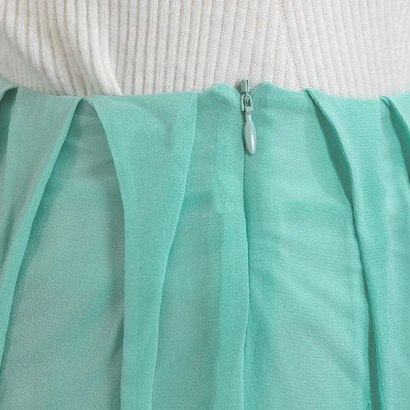 Close-up of the waist section and side invisible zipper on a women's Mulberry silk skirt in Cross Waves — From Borcelleclothes.