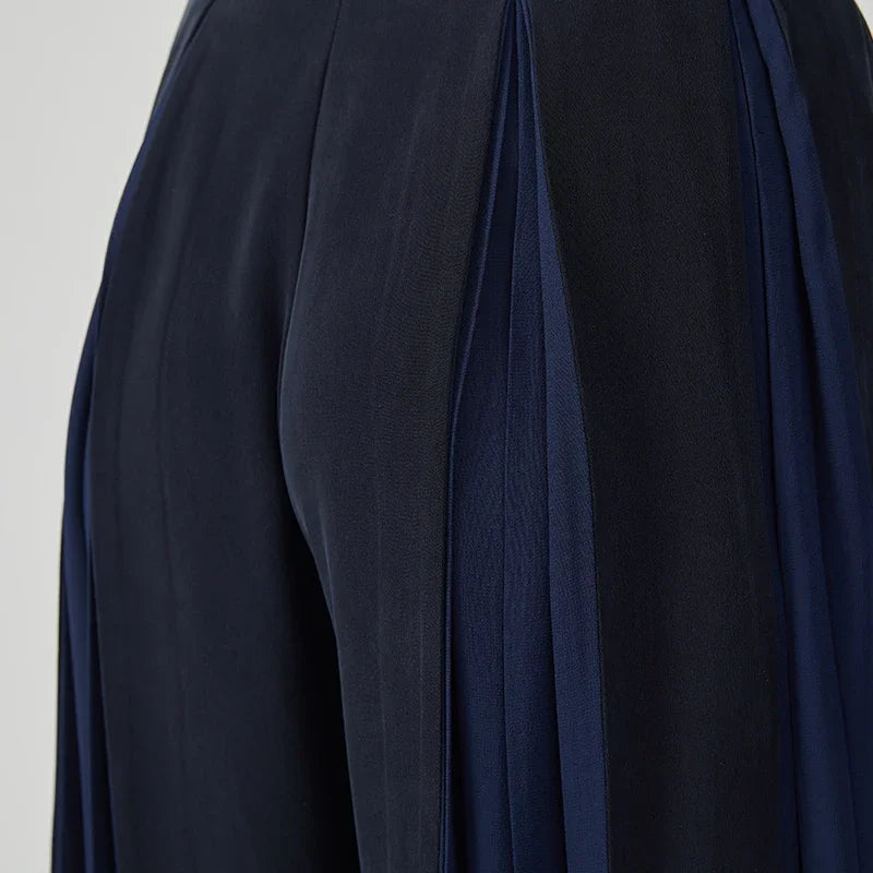 Back middle section detail of women's Mulberry silk trousers with georgette inserts in Vortex Flower — From Borcelleclothes.