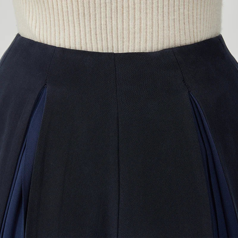 Front waist section detail of women's Mulberry silk trousers with georgette inserts in Vortex Flower — From Borcelleclothes.