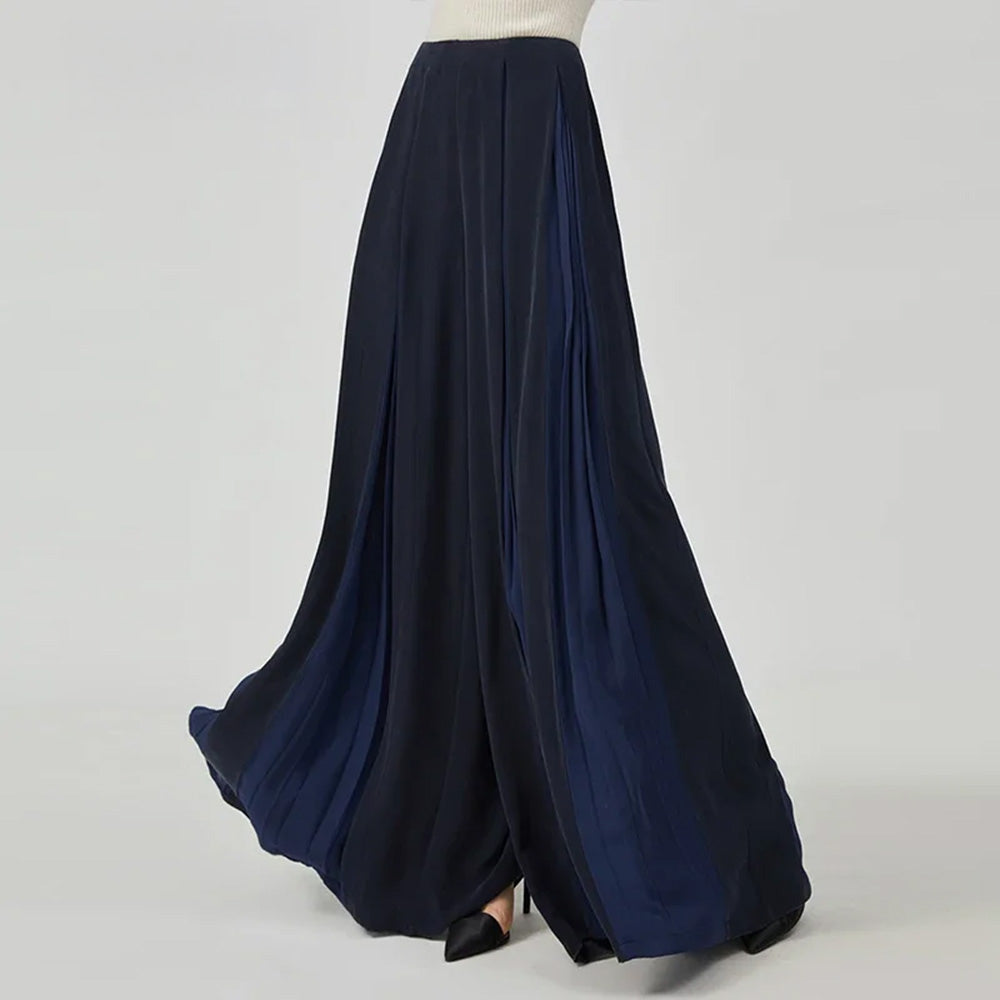 Women's Floor-length 30 Momme Mulberry silk crepe palazzo pants in Vortex Flower featuring pleated flared semi-sheer georgette inserts swirling at the front and back. — From Borcelleclothes.