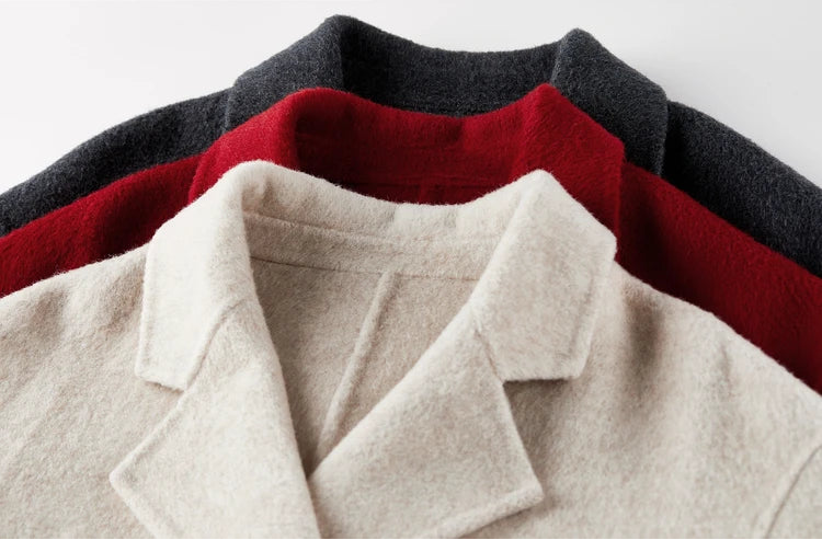 Detailed stack of double-faced virgin wool jackets showcasing notch lapels in Bohemian, Pause in Dialogue, and Sweet Rebellion colors. — From Borcelleclothes.