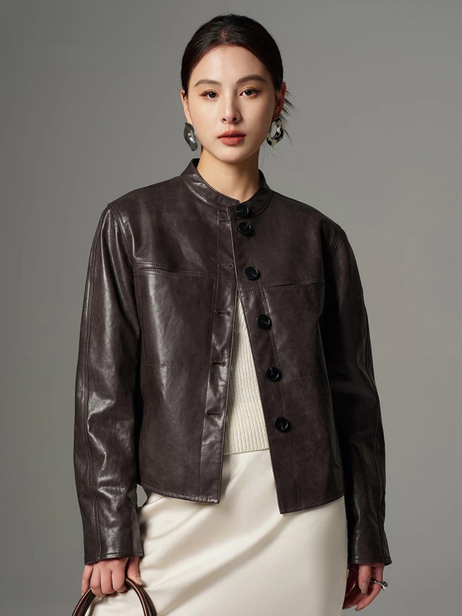 Portrait of a model wearing the oil-waxed goatskin overshirt jacket in First Impression looking directly into the camera — From Borcelleclothes.