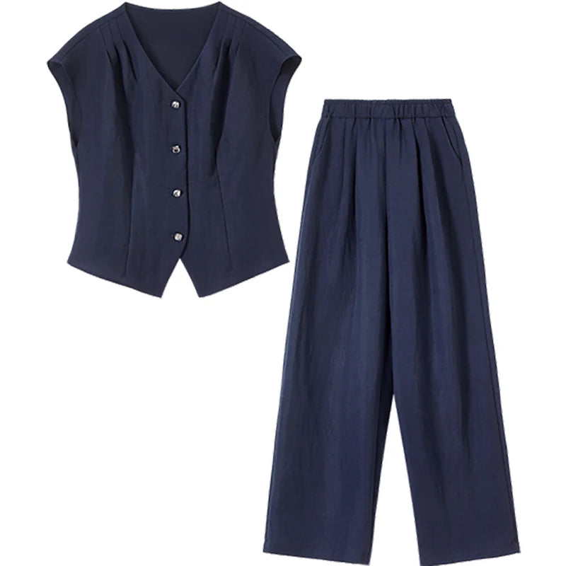 A precise flat-lay of the L'Oiseau Bleu set, showing the symmetrical balance and structured design — From Borcelleclothes.