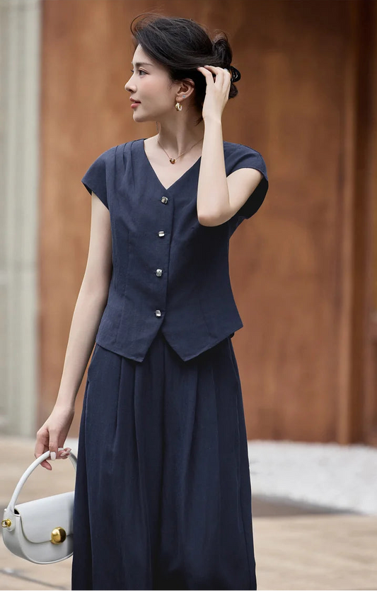 A serene moment featuring the L'Oiseau Bleu set; the model's movement highlights the natural drape of the cool, breathable lyocell and viscose — From Borcelleclothes.