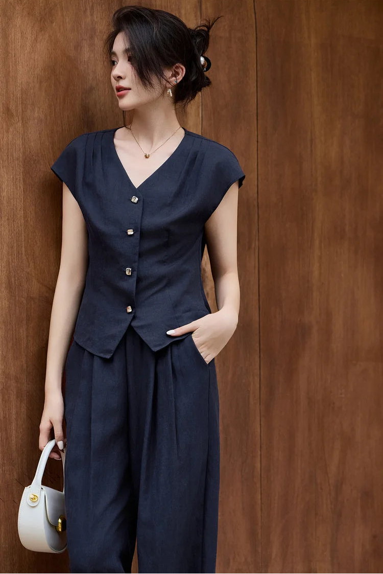 The L'Oiseau Bleu set styled for a day in the city, showing its versatility and sophisticated deep blue hue — From Borcelleclothes.